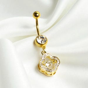 Piercing per ombelico con gemma danzante, anello pendente in oro con fiore e zirconi cubici