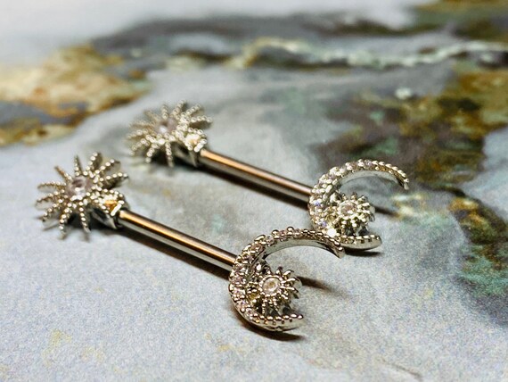 A Set of Sun and Crescent Moon Nipple Barbell. Nipple 