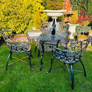 Daisy cast sale iron garden furniture