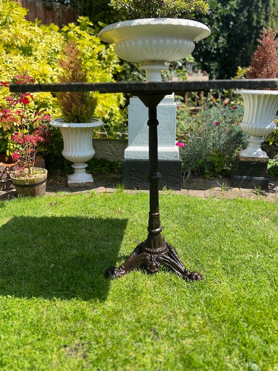 Granite pedestal table deals