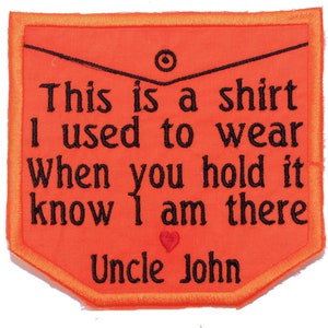 May include: Orange fabric patch with black embroidered text that reads "This is a shirt I used to wear when you hold it know I am there Uncle John" with a small red heart.