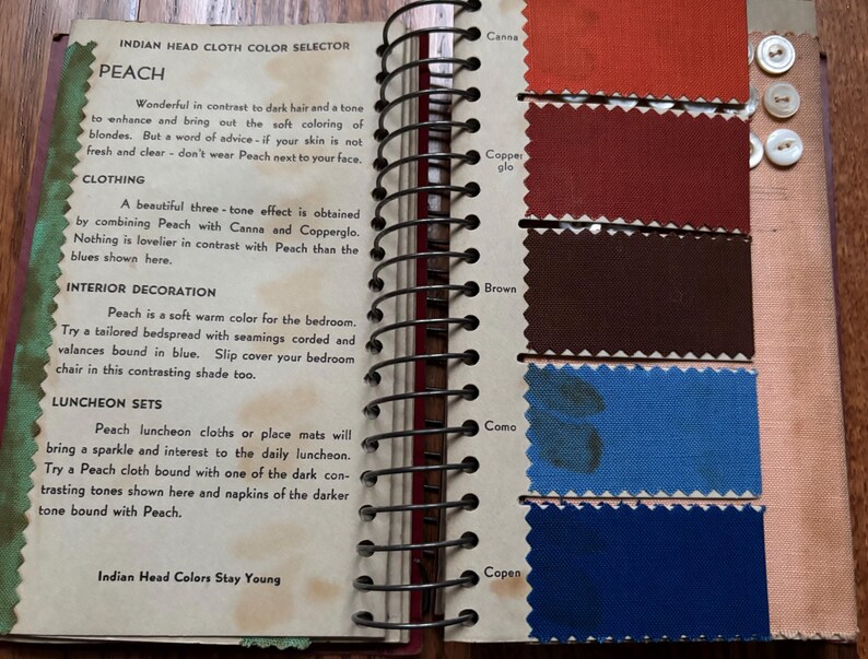 May include: A page from a vintage color guide for Indian Head Cloth. The page features the color Peach and shows how it pairs with other colors, including Canna, Copperglo, Brown, Como, and Copen. The text describes how to use Peach in clothing, interior decoration, and luncheon sets.