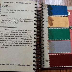 May include: A vintage color selector guide for Indian Head cloth, featuring the color coral. The guide includes a description of the color and its uses in clothing and interior decoration. The page also shows swatches of different colors, including cadet, sangold, turf, silver, and copperglo.