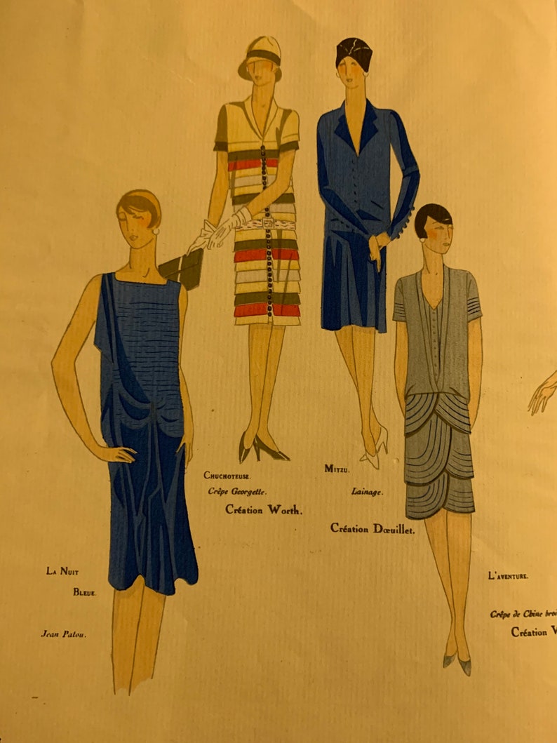 May include: A vintage fashion illustration featuring three women wearing different styles of dresses. The woman on the left is wearing a blue dress with a draped neckline. The woman in the center is wearing a striped dress with a white belt. The woman on the right is wearing a blue dress with a scalloped hem. The illustration is titled "La Nuit Bleue", "Chuchoteuse", "Mitzu", and "L'Aventure".