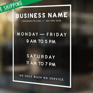 May include: A rectangular white vinyl window decal featuring the text BUSINESS NAME, YOURWEBSITE.COM, 353-555-3535, MONDAY-FRIDAY 9 AM TO 5 PM, SATURDAY 11 AM TO 7 PM, and NO FACE MASK NO SERVICE, all enclosed within a thin white rectangular border.