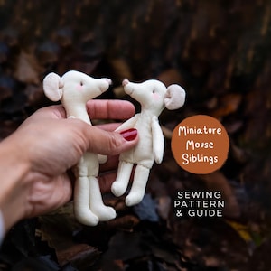May include: Two small, off-white fabric mouse dolls with pink-tinted cheeks and rounded ears. A circular brown graphic features the white text Miniature Mouse Siblings, followed by the text SEWING PATTERN & GUIDE in white capital letters.