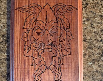 Grouchy man burned into wood