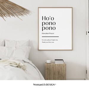 May include: A white framed print with the text "Ho'o pono pono" and "Hawaiian Prayer" in black. The text below reads "I'm sorry, please forgive me, Thank you, I love you."