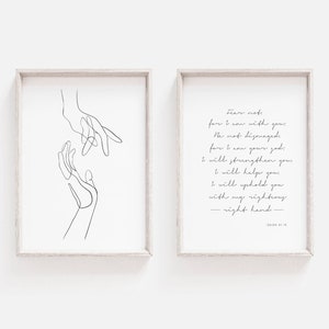 May include: Two printable art prints with a black and white line drawing of two hands reaching towards each other. The second print features a bible verse from Isaiah 41:10, "Fear not, for I am with you; be not dismayed, for I am your God. I will strengthen you and help you; I will uphold you with my righteous right hand."