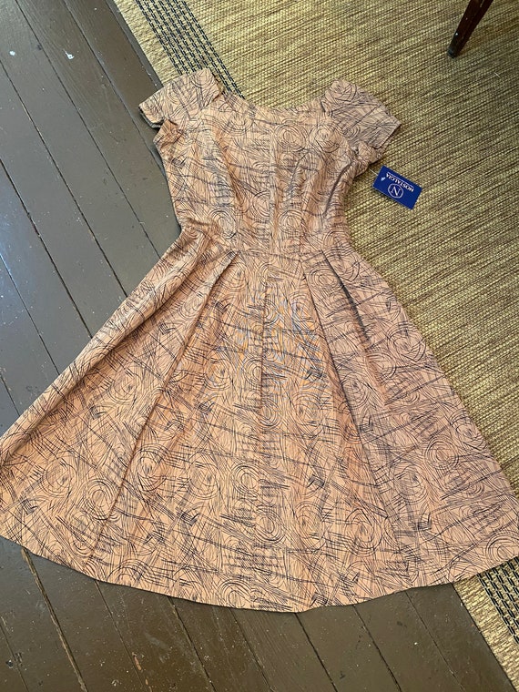 1950s A-line squiggle dress.