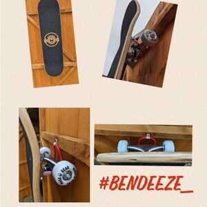K&ouml;nnte beinhalten: Schwarzes Skateboard mit Totenkopf-Logo, montiert an einer Holzkonstruktion. Wei&szlig;e Rollen mit dem Aufdruck "BEAR". Der Hashtag #BENDEZE_ ist sichtbar.