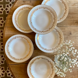 Set of 6 vintage Moulin des Loups soup plates