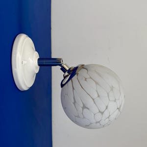 Vintage globe wall lamp in white Clichy glass