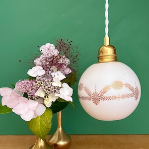 Vintage globe pendant light in white opaline with gold designs