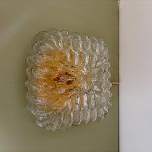 Vintage globe wall or ceiling light in transparent molded glass