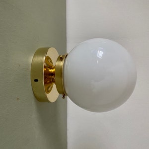 Vintage globe wall or ceiling light in white opaline