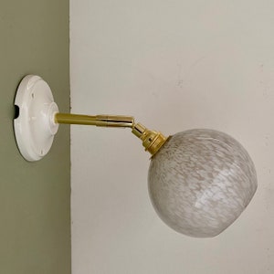 Vintage globe wall light in white Clichy glass