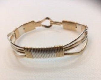 Gold filled and sterling silver bracelet.