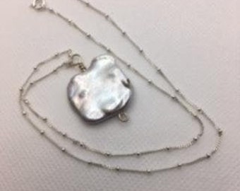 Pearl pendant on an 18 inch sterling silver chain