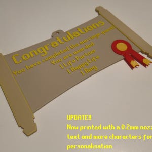 May include: A beige scroll-shaped plaque with yellow text reading Congratulations, You have completed the marriage quest, You are awarded 1 Life Partner, 1 Happy Life, 1 Ring. It features a red and yellow ribbon emblem and a small hanging loop.