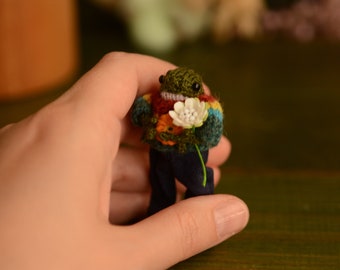 Miniature Knitted frog with clothes.