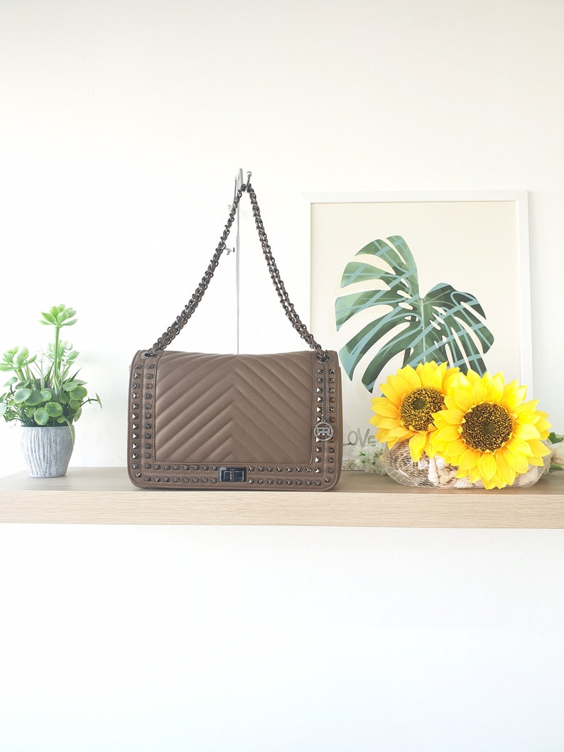 shoulder bag for women in real leather tassel sauvage quilted with studs handmade in Italy Roberta Rossi made in Italy