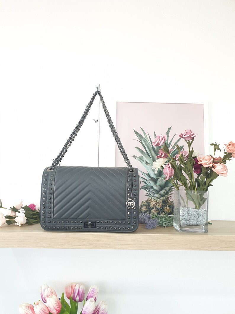 shoulder bag for women in real leather tassel sauvage quilted with studs handmade in Italy Roberta Rossi made in Italy