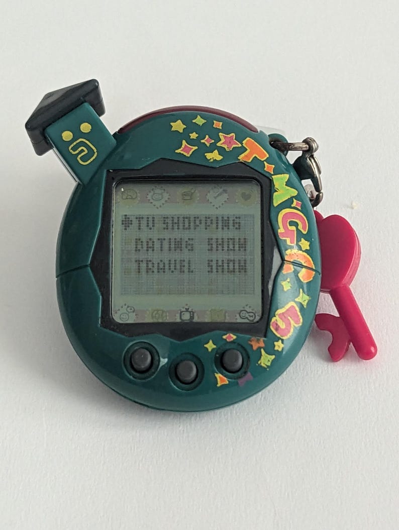 Bandai Tamagotchi V5 Familitchi Connection Version 5 TMGC 5 Interaktivt Elektroniskt Husdjur Asien Oceanien Exklusivt Sällsynt Virtuellt Husdjur bild 1