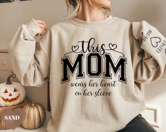 Custom Mom Sweatshirt, Personalized Kids Names Crewneck, This Mom Wears Her Heart On Her Sleeve, Mama Nana Grandma
