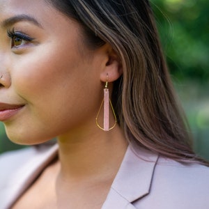 The Charlotte "Draped" Collection. Beautiful genuine leather wrapped 22c gold plated hoops.