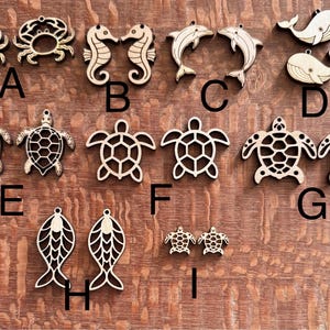 May include: Wooden laser-cut sea creature shapes, including crabs, seahorses, dolphins, whales, turtles, and fish. These decorative cutouts are ideal for crafting and nautical-themed projects. The shapes are unpainted and ready for customization.