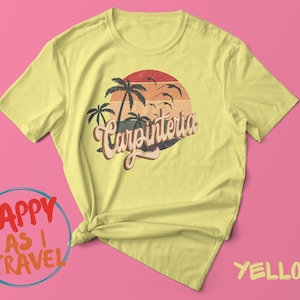 May include: Yellow t-shirt with a retro sunset graphic and the text "Carpinteria" in a vintage font.