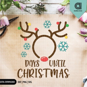 Puede incluir: Una diadema de reno marr&oacute;n con adornos rojos, verdes y amarillos. La diadema tiene el texto "Days Until Christmas" en letras marrones.