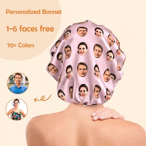 May include: A pink satin bonnet featuring multiple faces. Text on the image reads "Personalized Bonnet", "1-6 faces free", and "70+ Colors". The bonnet is displayed on a person's head.
