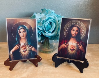 Sacred Hearts of Jesus and Mary 4.5x6.5 Print. Please be aware that the lamination makes the image bigger and won’t fit in a 4X6 frame.