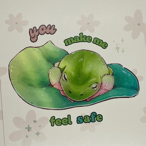 Me haces sentir segura / Tarjeta de rana / Regalo de juego de palabras / Tarjeta de rana, regalo para ella / Postal / Tarjeta de felicitación / Regalo de afirmación de relación