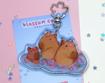 Zawieszka Blossom Capybara | Zawieszka Capy Key | Akcesoria do kluczy | Brelok akrylowy | Zapięcie kwiatowe | Brelok ze zwierzęciem | Epoksyd | Dwustronny