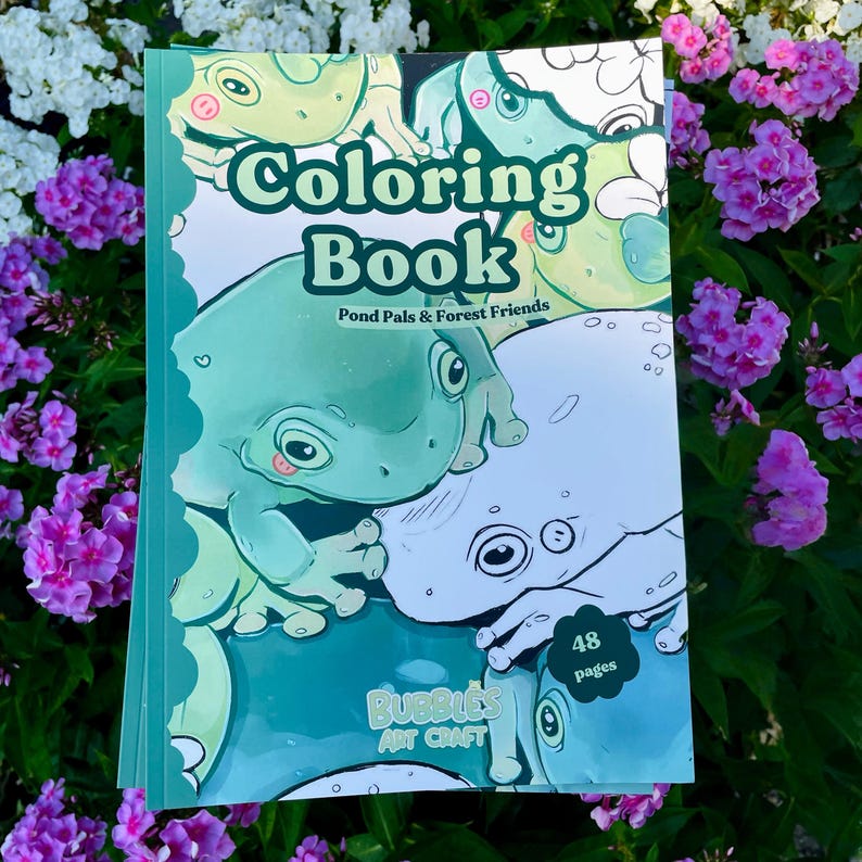 May include: A coloring book titled "Coloring Book" with the subtitle "Pond Pals & Forest Friends." The cover features illustrations of frogs in shades of green and white. The book has 48 pages and is labeled "Bubbles Art Craft."