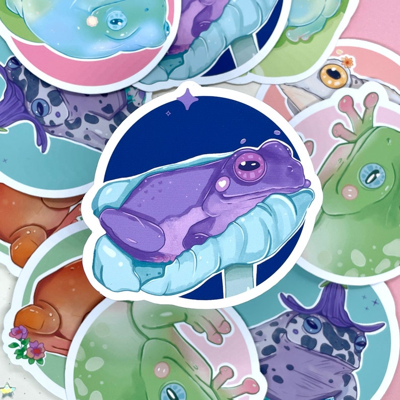 May include: A set of 10 frog stickers featuring different frog designs. The stickers are colorful and feature a variety of frog poses and expressions. The stickers are perfect for adding a touch of whimsy to your belongings.