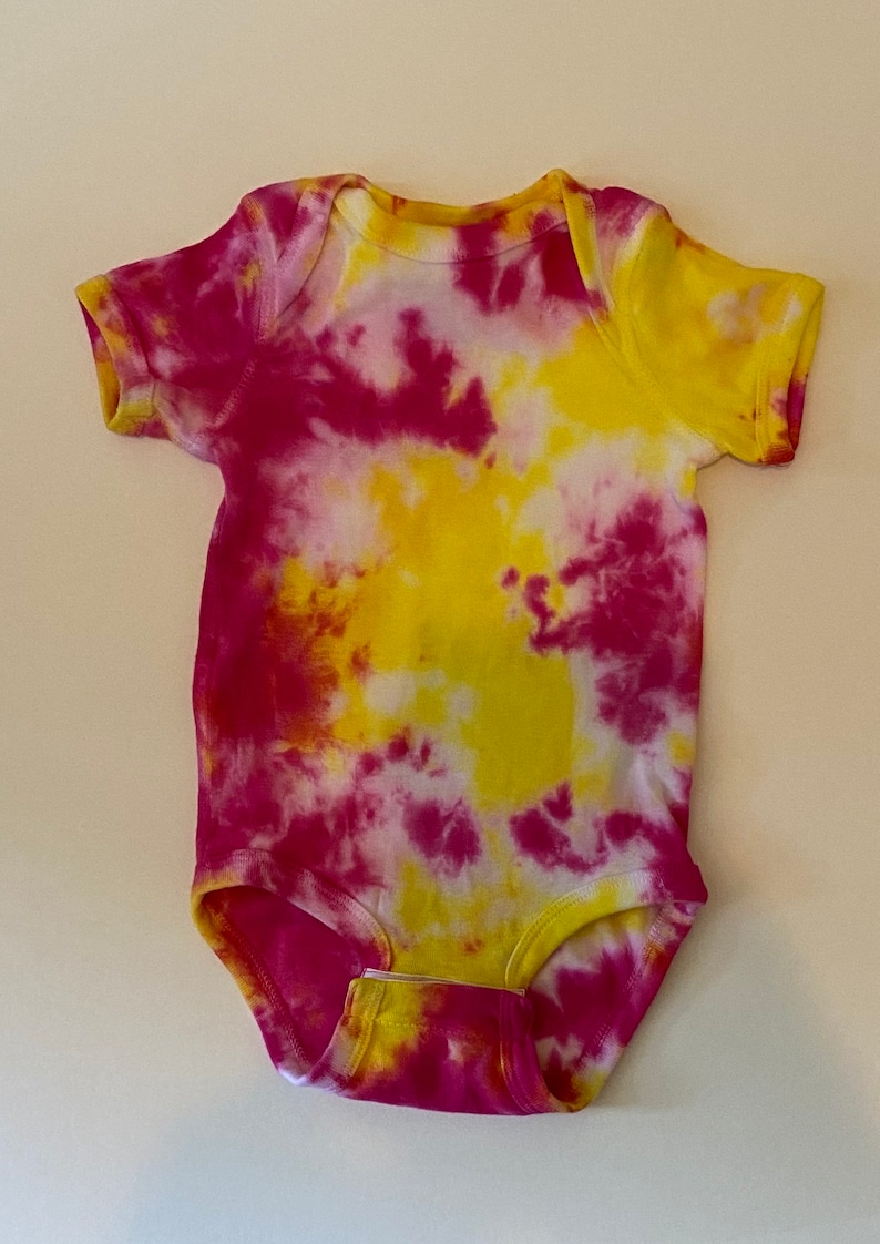 Yellow and pink onesie