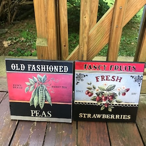 Láminas artísticas vintage de Kimberly Poloson: Frutas elegantes y guisantes a la antigua usanza, montadas en madera.