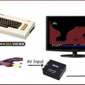 May include: A beige Commodore VIC20 computer with a black keyboard, a multi-colored logo, a red and yellow AV cable, a black Mini AV to HDMI converter box, and a monitor displaying a retro video game with red terrain and black sky.