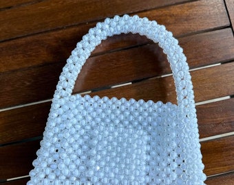 Bag made of white beads.