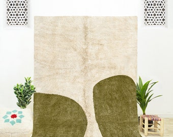 A traditionally handwoven green abstract rug | A green Moroccan rug 9x12 that can be placed as a green bedroom rug