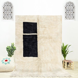 A modern black and white Moroccan geometric rug handwoven using natural ivory wool rug | Custom black and white Moroccan shag rug 8x10
