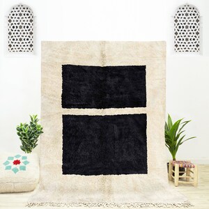 Handwoven Black and White Moroccan Wool Rug: Abstract Ivory Design