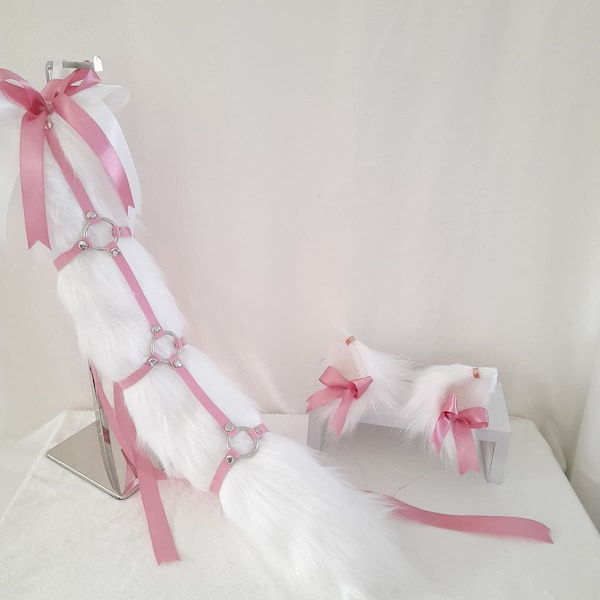 Roze en wit - Ontwerp met bandjes - Spelen met kittens - Oor- en staartbezetting.