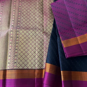 Unique Pure Kanchipuram Silk Saree in Dark Coffee Brown with Orange and Magenta Border and a Grand Pallu in intricate Gold Zari