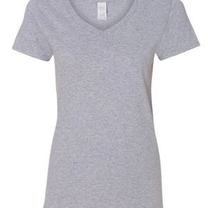 May include: A heather gray short-sleeved v-neck t-shirt.