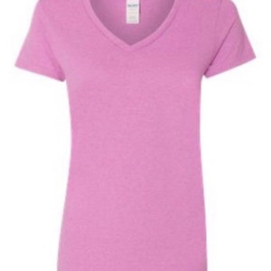 May include: A plain, light purple v-neck t-shirt with short sleeves.